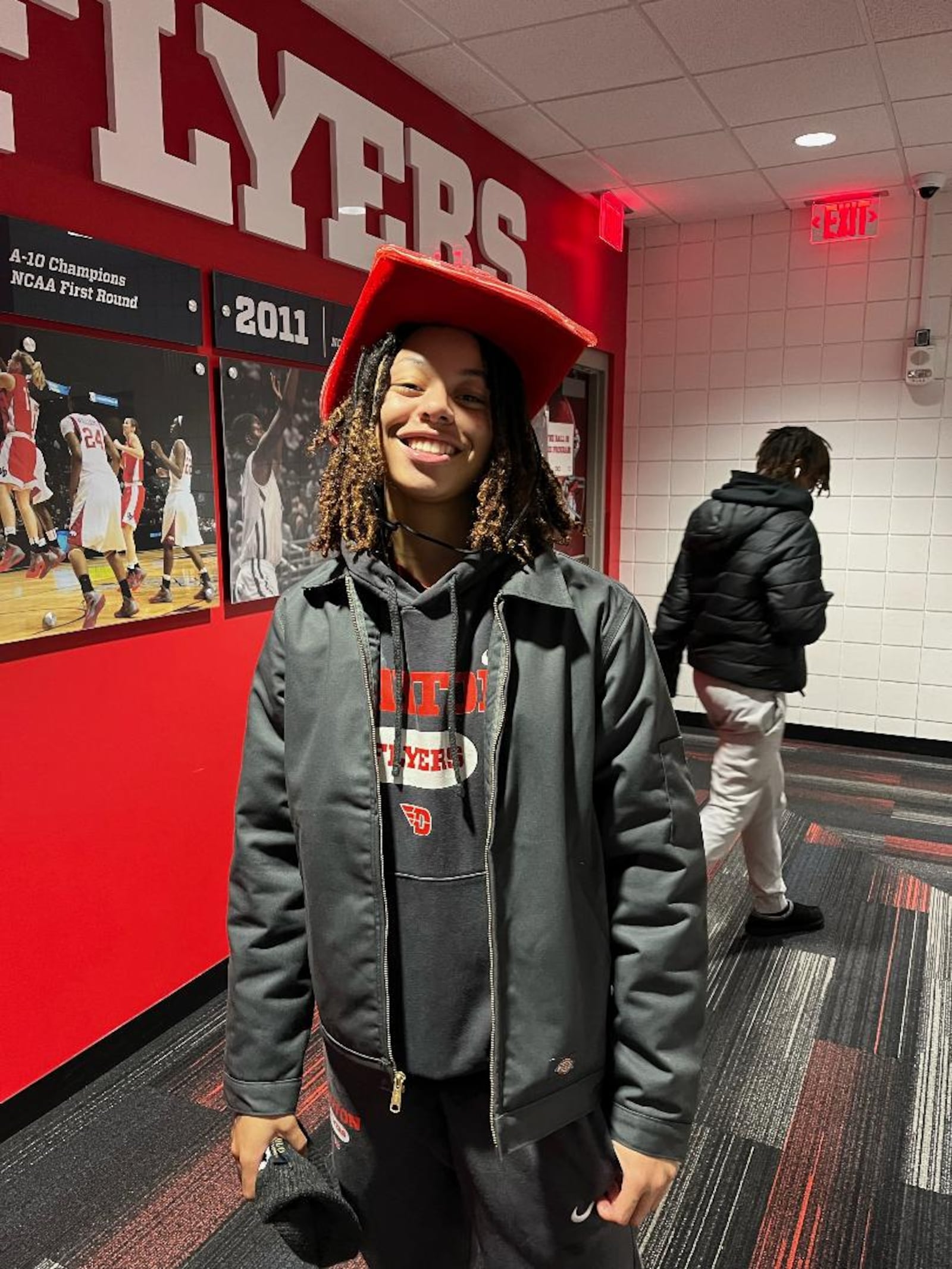 Dayton's Nayo Lear leaves the locker room after Sunday's game in a red cowboy hat. Ross Bagienski/UD Athletics

