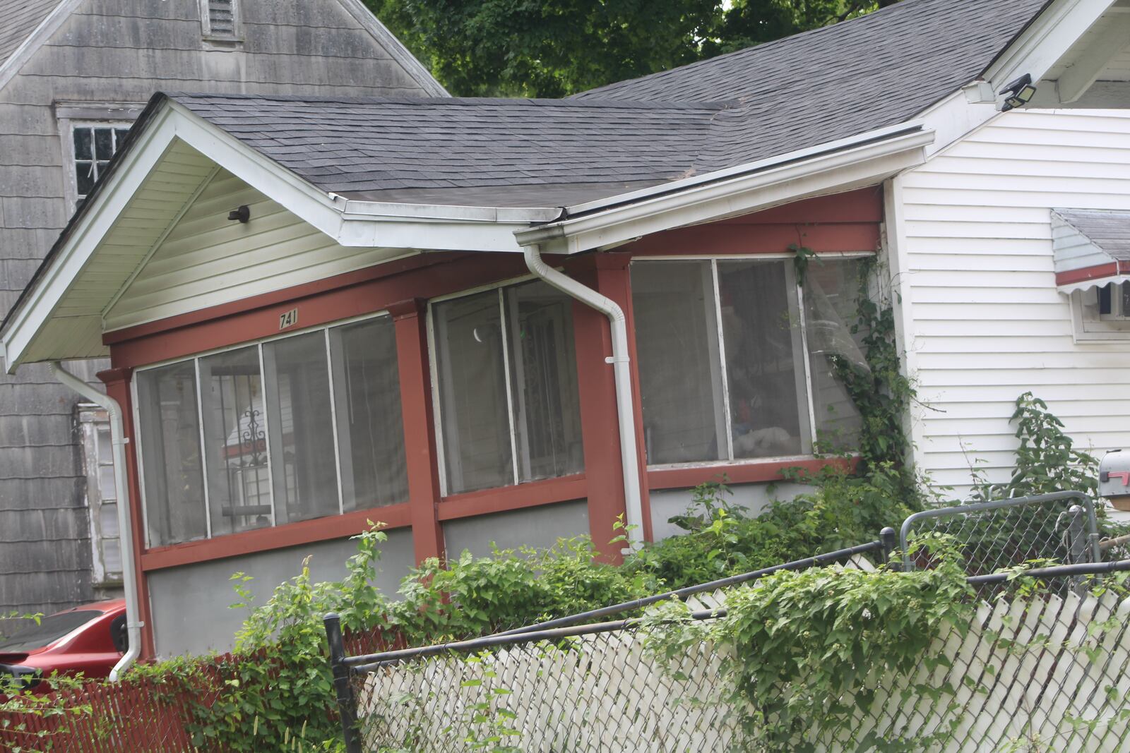 The owner of this home in northwest Dayton has filed an eviction action against the tenant. An eviction hearing is expected later this month. CORNELIUS FROLIK / STAFF