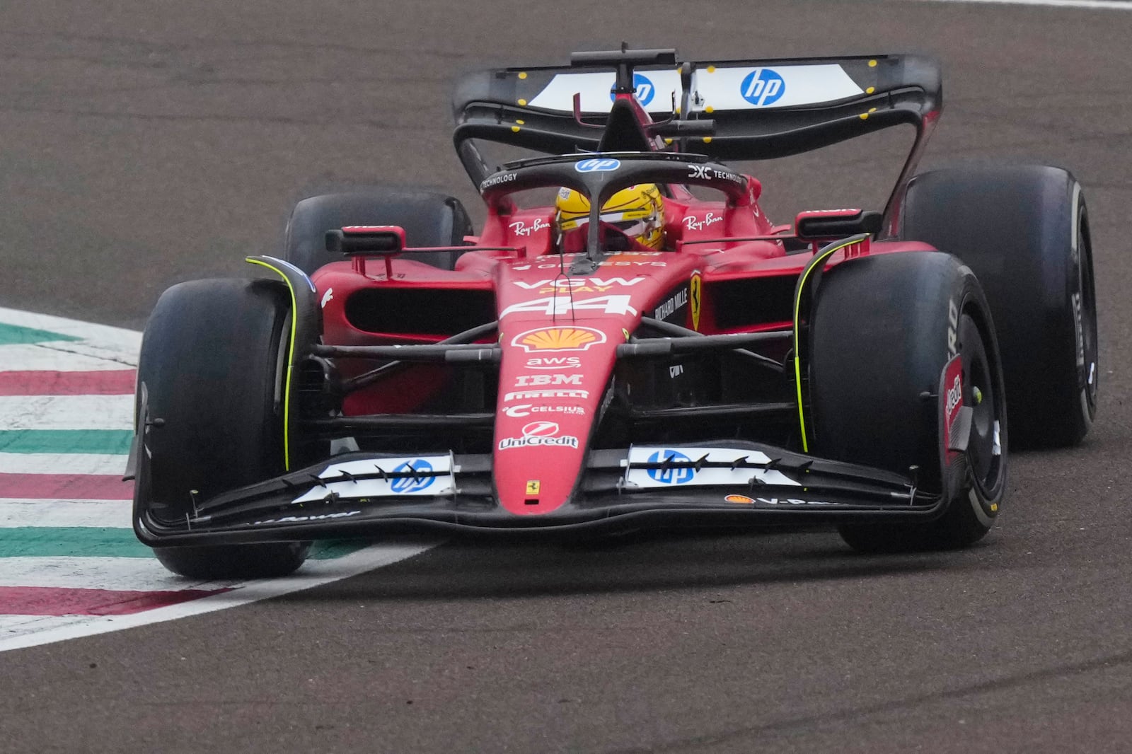 British driver Lewis Hamilton steers a Ferrari Formula One SF-23 at the Ferrari private test track, in Fiorano Modenese, Italy, Wednesday, Jan.22, 2025. (AP Photo/Luca Bruno)