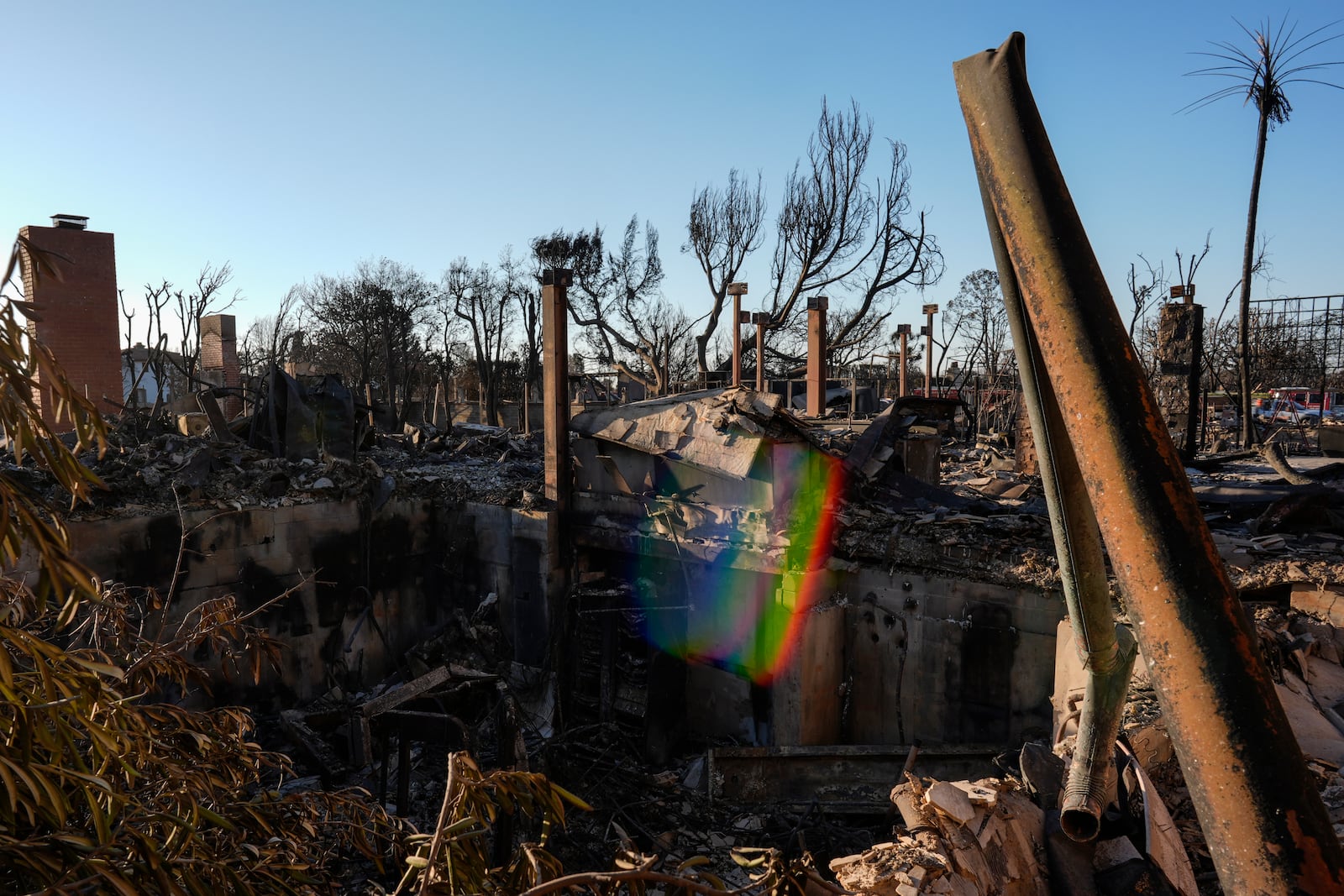 The remains of Chef Daniel Shemtob and his wife Elyse's home that was destroyed by the Palisades Fire is seen in the Pacific Palisades neighborhood of Los Angeles, Wednesday, Jan. 15, 2025. (AP Photo/Carolyn Kaster)