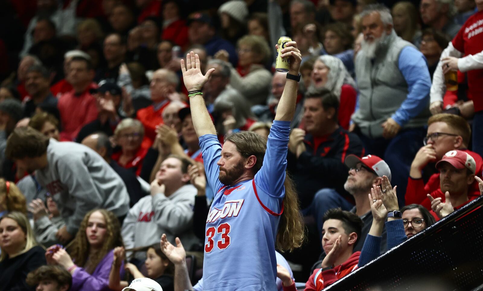 Dayton fans cheer during a game against Cincinnati on Saturday, Dec. 16, 2023, at the Heritage Bank Center in Cincinnati. David Jablonski/Staff