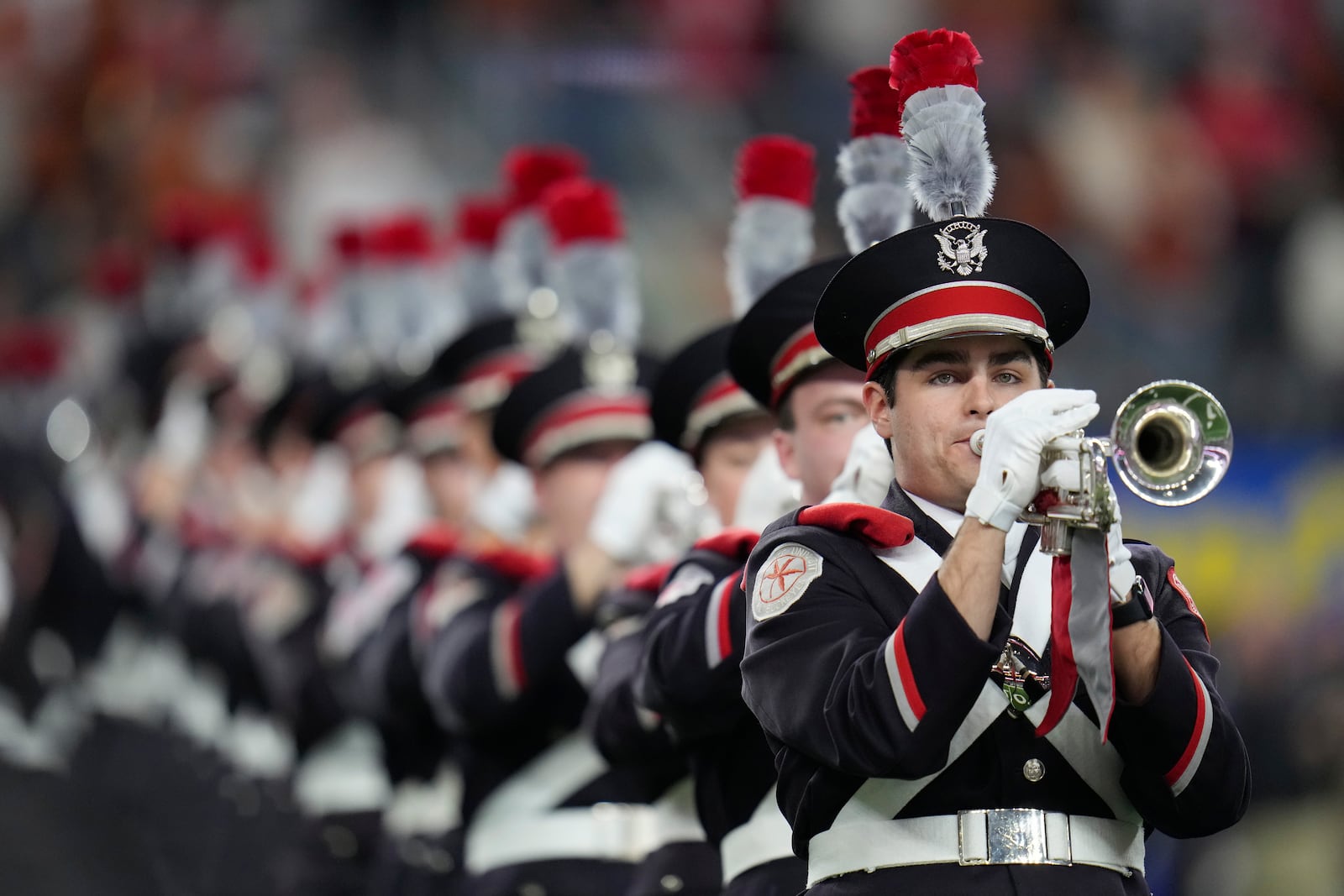 The Ohio State band performs before the Cotton Bowl College Football Playoff semifinal game between Texas and Ohio State, Friday, Jan. 10, 2025, in Arlington, Texas. (AP Photo/Julio Cortez)