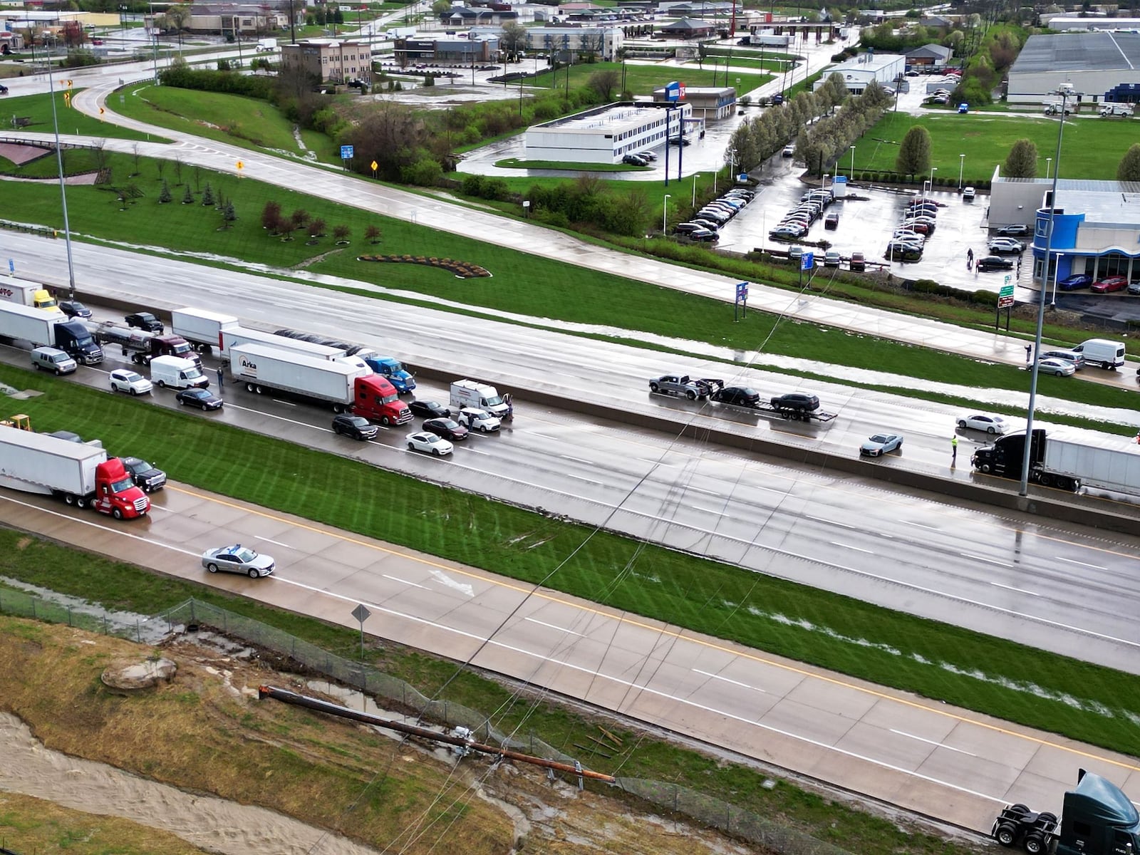 Interstate 75 was closed in both directions Tuesday, April 2, 2024, in Monroe after strong winds during a thunderstorm knocked wires down across the highway. NICK GRAHAM/STAFF