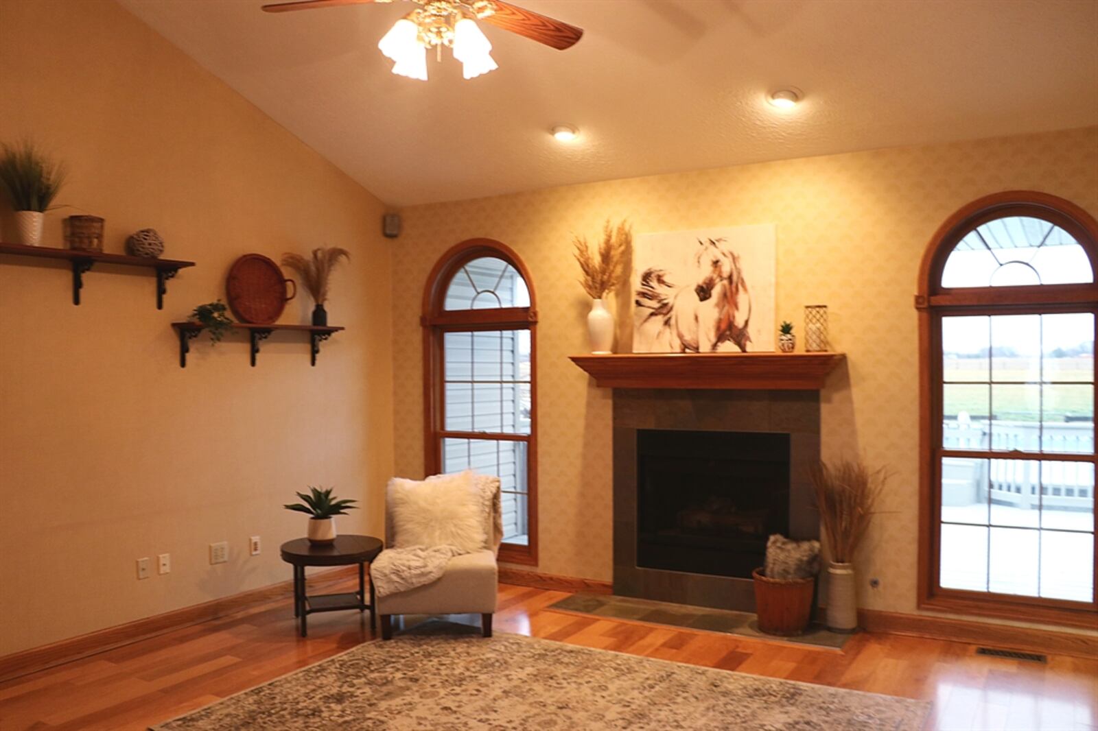 Straight off the foyer is the great room with a cathedral ceiling, fireplace and hardwood flooring. CONTRIBUTED BY KATHY TYLER