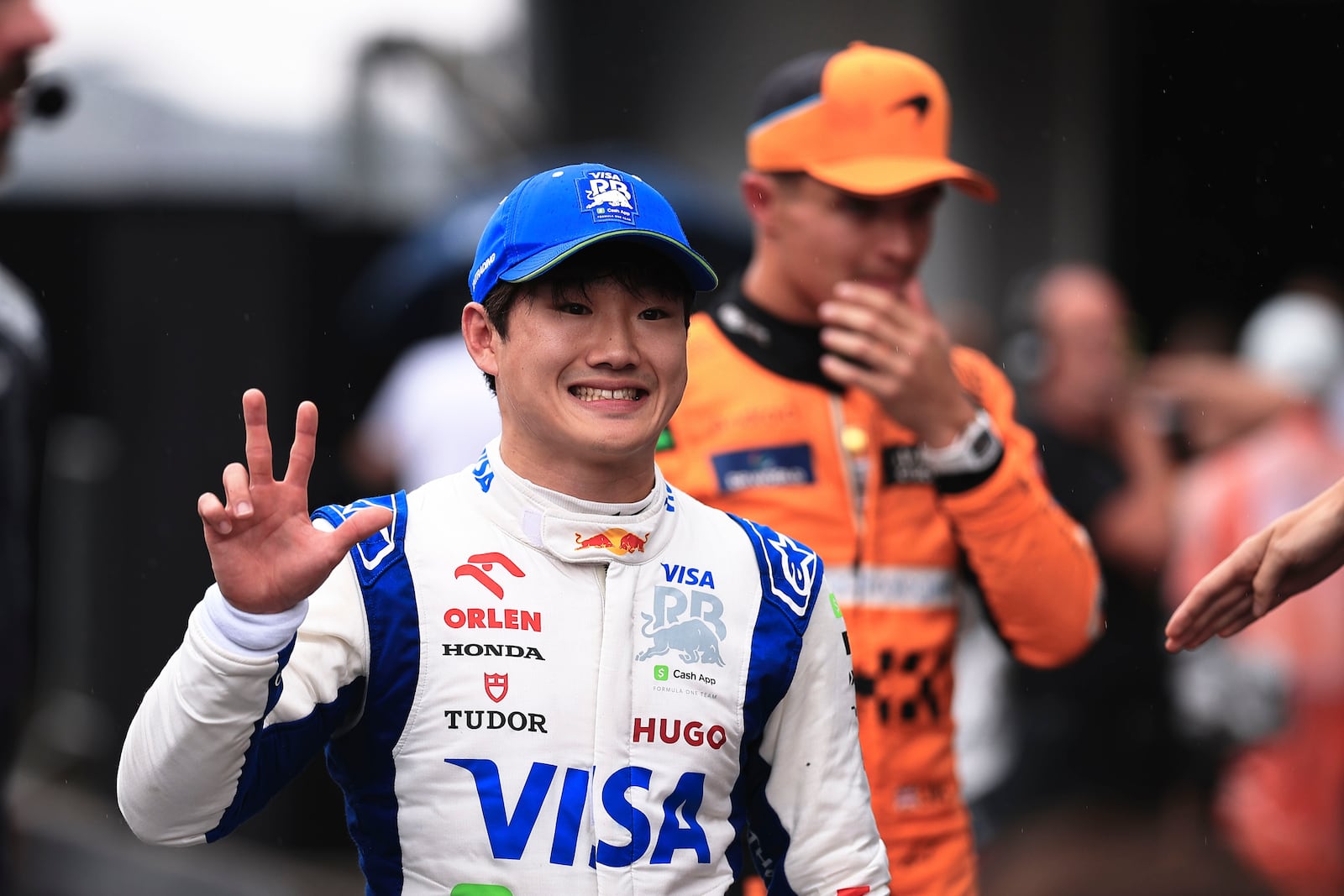 RB driver Yuki Tsunoda of Japan, celebrates his third place after the qualifying session ahead of the Brazilian Formula One Grand Prix at the Interlagos race track, in Sao Paulo, Brazil, Sunday, Nov. 3, 2024. (AP Photo/Ettore Chiereguini)