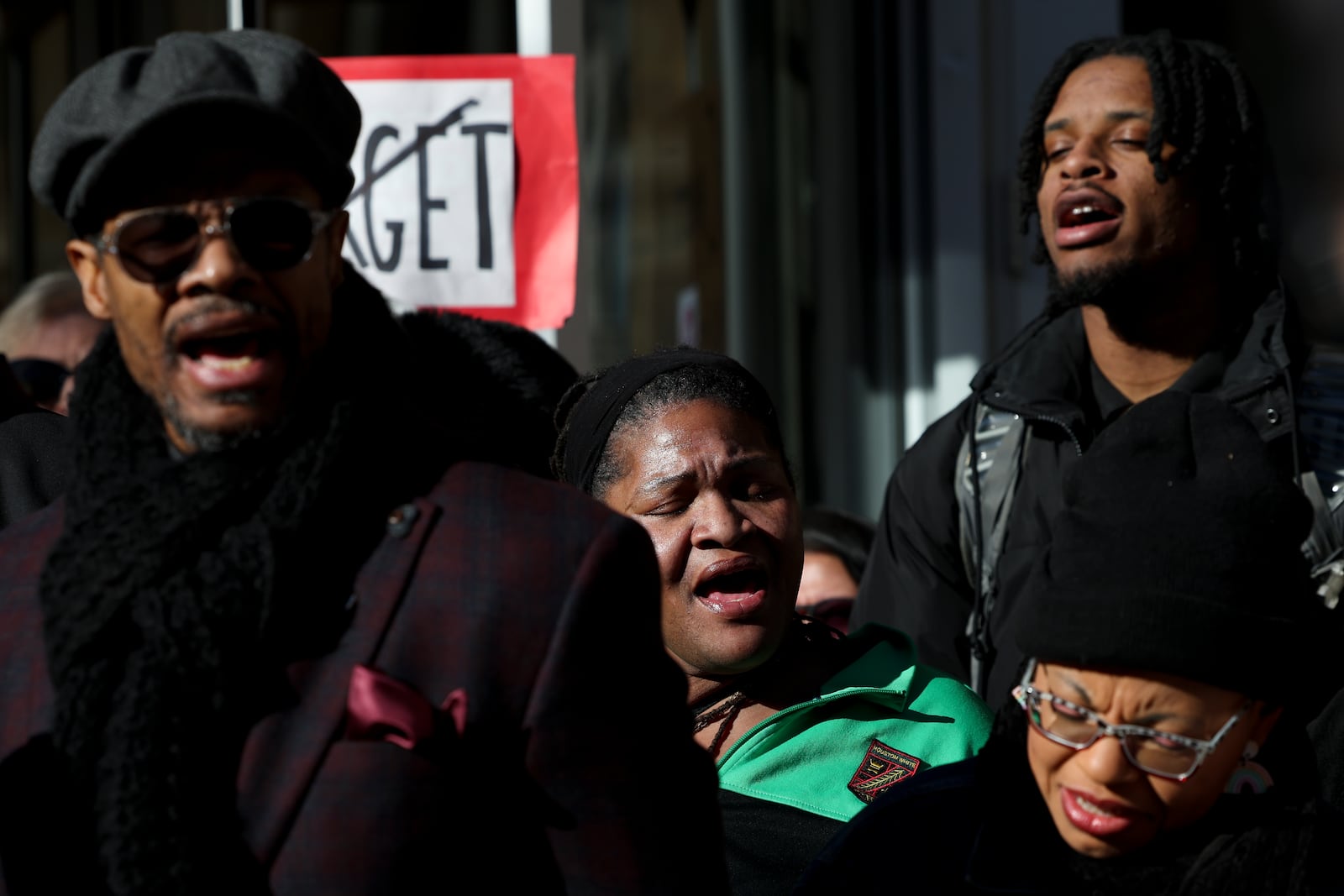 Community members chant during a news conference outside Target Corporation's headquarters Thursday, Jan. 30, 2025, in Minneapolis, Minn. (AP Photo/Ellen Schmidt)