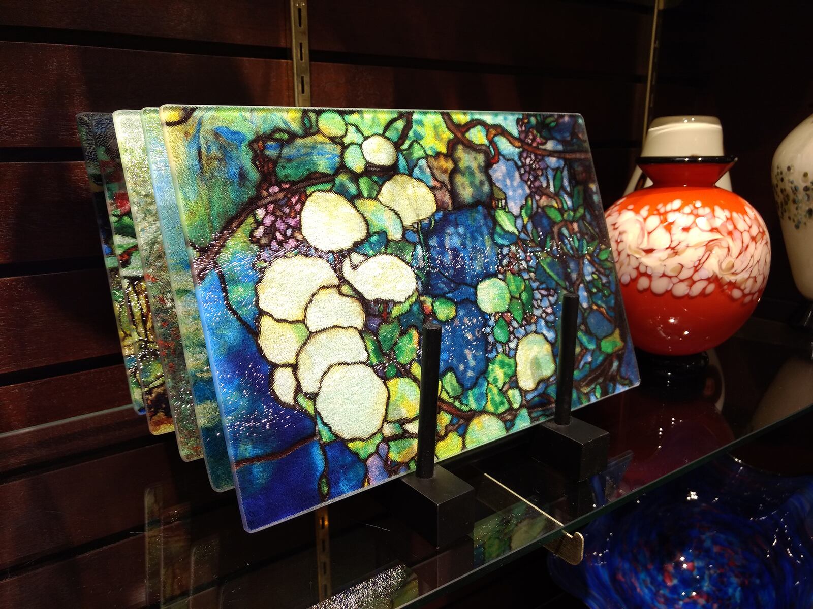 Glass Cutting Boards: $29 each Add style to your kitchen and entertainment areas with a custom glass cutting board. Featuring designs based on Tiffany art glass, these cutting boards are both decorative and functional. (11.5" x 7.5")