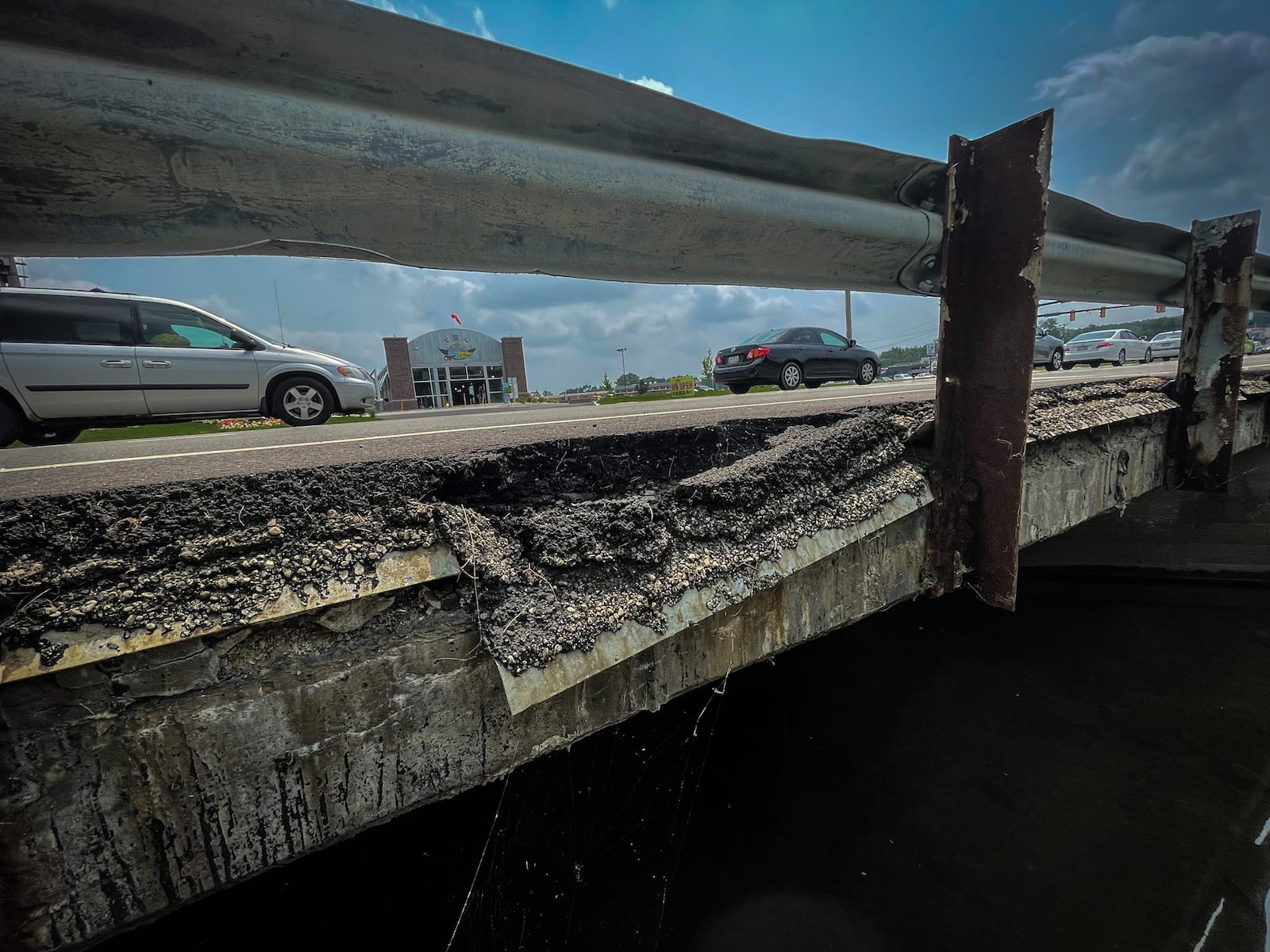 This 2021 picture shows deterioration of an Airway Road bridge scheduled for rehabilitation. Many smaller local bridges are the responsibility of cities and counties, rather than the Ohio Department of Transportation. JIM NOELKER/STAFF