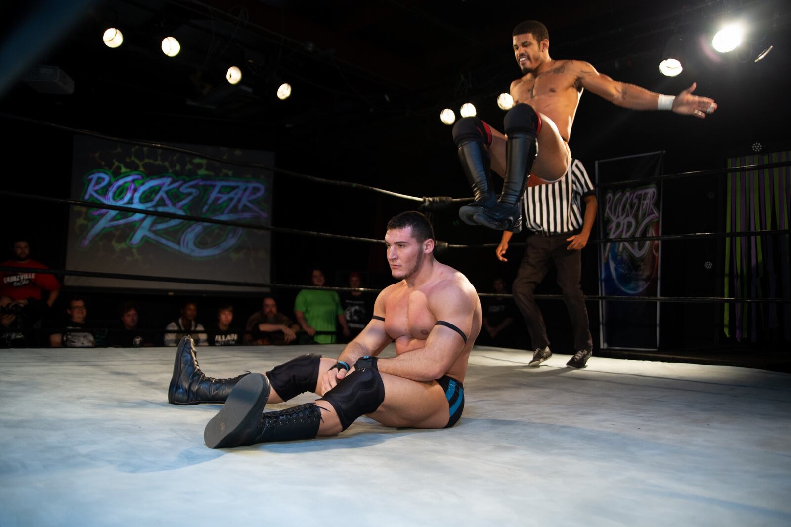 Clayton Gainz (sitting) and Dezmond Xavier are among the participants in Rockstar Pro Wrestling’s seventh anniversary wrestling match at Rockstar Pro Arena in Dayton on Friday, Feb. 1. CONTRIBUTED