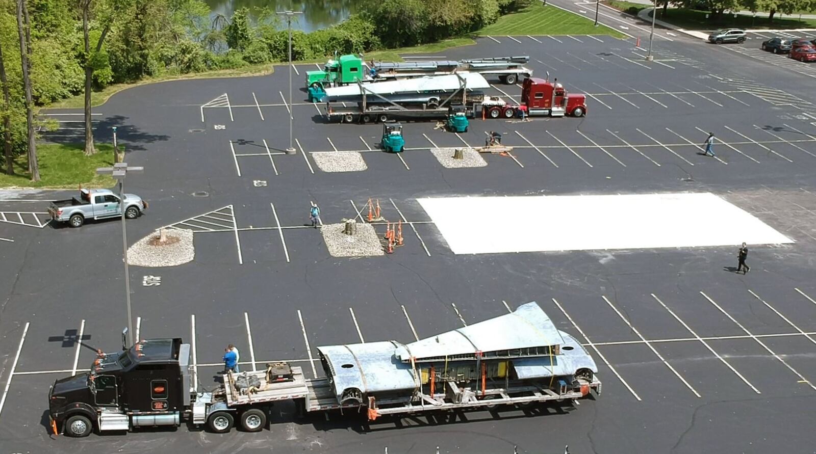 The University of Dayton Research Institute received a large shipment of airplane parts on Wednesday morning from the U.S. Air Force.. Additional parts are expected to arrive for the reassembly of a C-130 Hercules for research work contracted through the Air Force Research Lab. A large concrete pad, center right, was installed to support the weight of aircraft. TY GREENLEES / STAFF