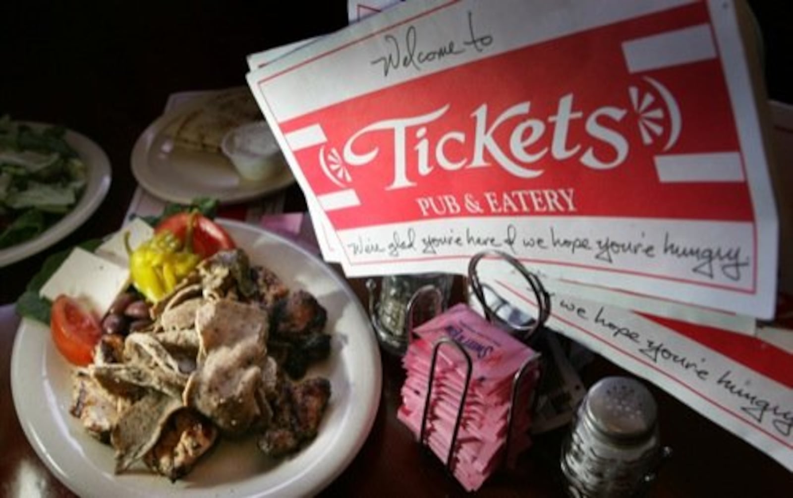 The menus at Tickets Pub and Eatery, in downtown Fairborn, also contains a welcoming message to patrons.