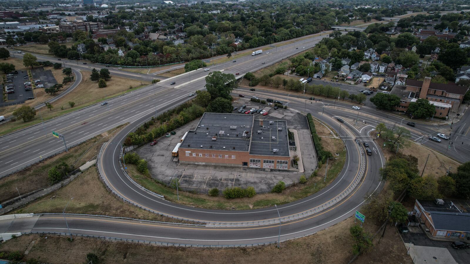 This is an aerial of US 35 and Keowee Street. The on- and off-ramps at Keowee Street encircle a charter school, leaving it on an island. The city of Dayton wants to study ways to make the highway and its connections work better for motorists and the community. JIM NOELKER/STAFF