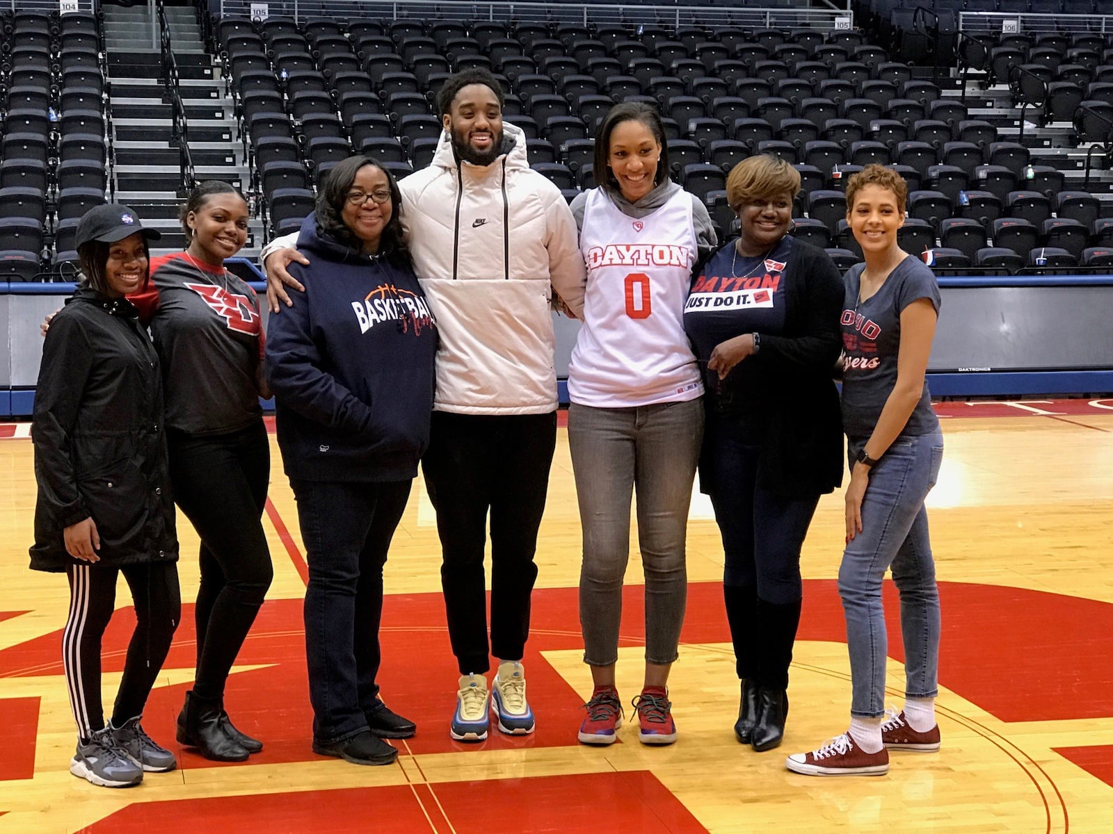 Dayton senior Josh Cunnigham was joined by friends and family on Senior Night at UD Arena. Pictured from left: cousin Kayla Henry; godsister Gabrielle Hardy; mom LaTanya; Josh; girlfriend A’ja Wilson; godmother Chanda Davis and cousin Brittany Young. Tom Archdeacon/STAFF