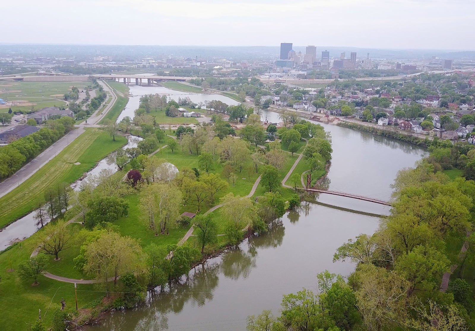 Island MetroPark is 33 acres of mature trees and green space along the Great Miami River at the confluence of the Stillwater River.   TY GREENLEES / STAFF