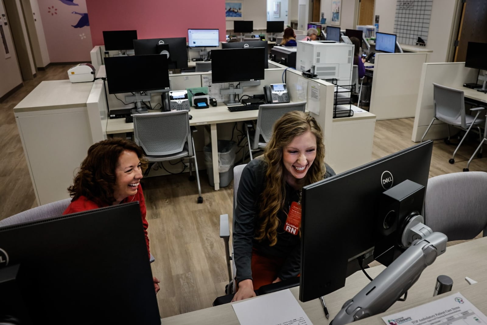 Cincinnati Children's registered nurses Kelly Wenning, left, and Sarah Morgan are part of the team at Cincinnati Children's renovated building on Clyo Road in Centerville. JIM NOELKER/STAFF