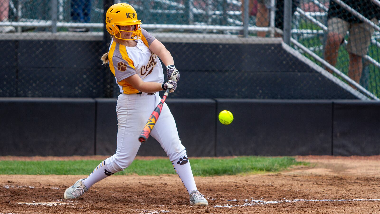 Kenton Ridge sophomore Natalee Fyffe connects for a two-run homer in the second inning Saturday to tie the score at 2-2. Jonathan Alder went on to win the Division II region final 5-2 at Mason. Photo by Jeff Gilbert