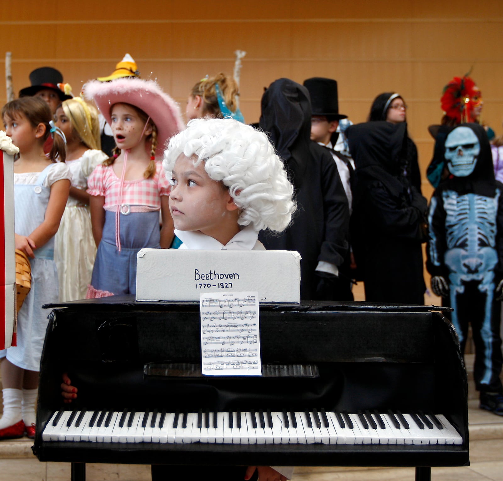 Mollie Steen, 6, of Beavercreek wins a first place in the 6-year-old to 9-year-old class for her piano costume at the Dayton Philharmonic Orchestra's annual PhilharMonster Concert and costume contest Saturday, Oct. 30, 2010, at the Schuster Center.