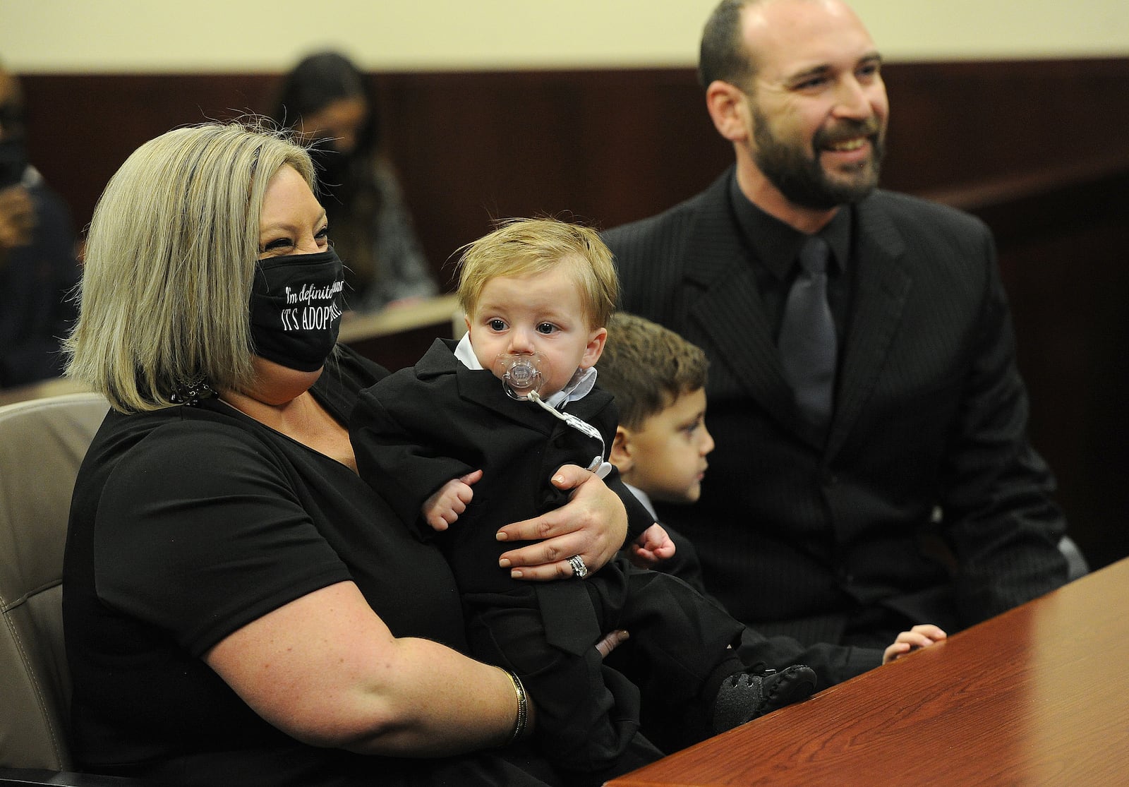 Alexis and Scott Warrick adopted Emerson Warrick Friday, Nov. 19, 2021 during adoption day at the Montgomery County Probate Court. Emerson is the biological little brother of Sawyer, pictured, who was also adopted by the Warricks previously. MARSHALL GORBY\STAFF