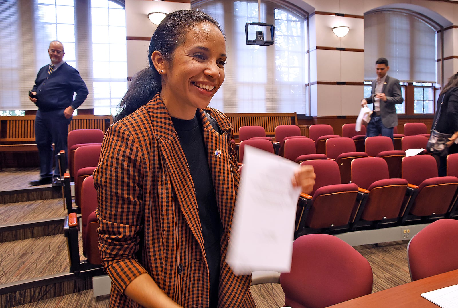 Ginnette Gutierrez, who is from the Dominican Republic and now lives in Indiana, talks about becoming an American citizen Monday, Sept. 18, 2023 following a naturalization ceremony held at the University of Dayton School of Law. BILL LACKEY/STAFF