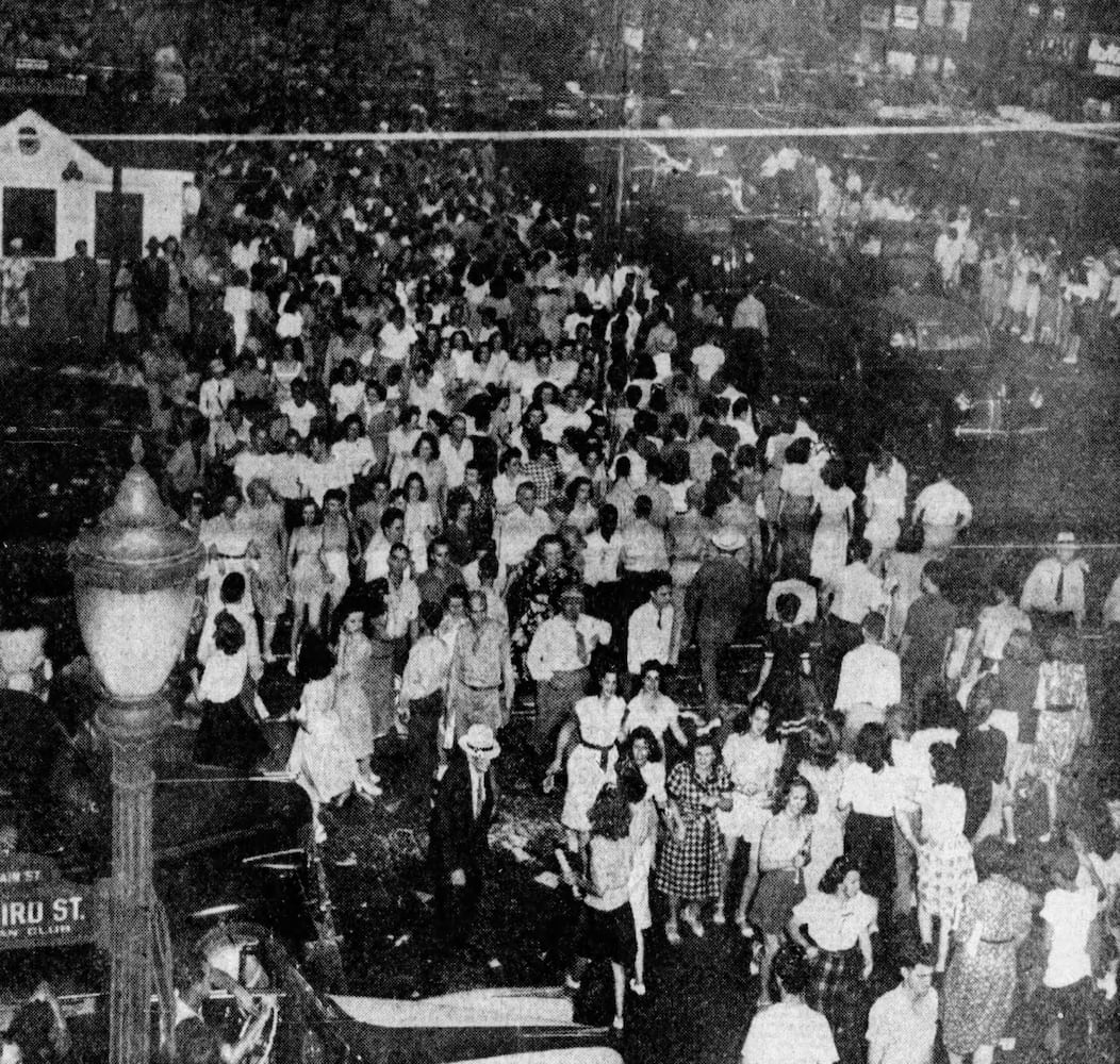 PHOTOS: Joyful crowds fill downtown Dayton celebrating the end of World War II