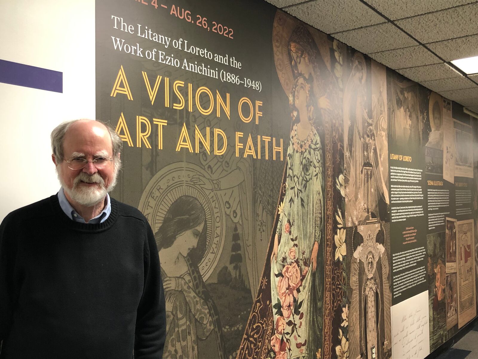 John Shaffer, co-curator of  “A Vision of Art and Faith,” stands near the start of the exhibit at UD. CONTRIBUTED