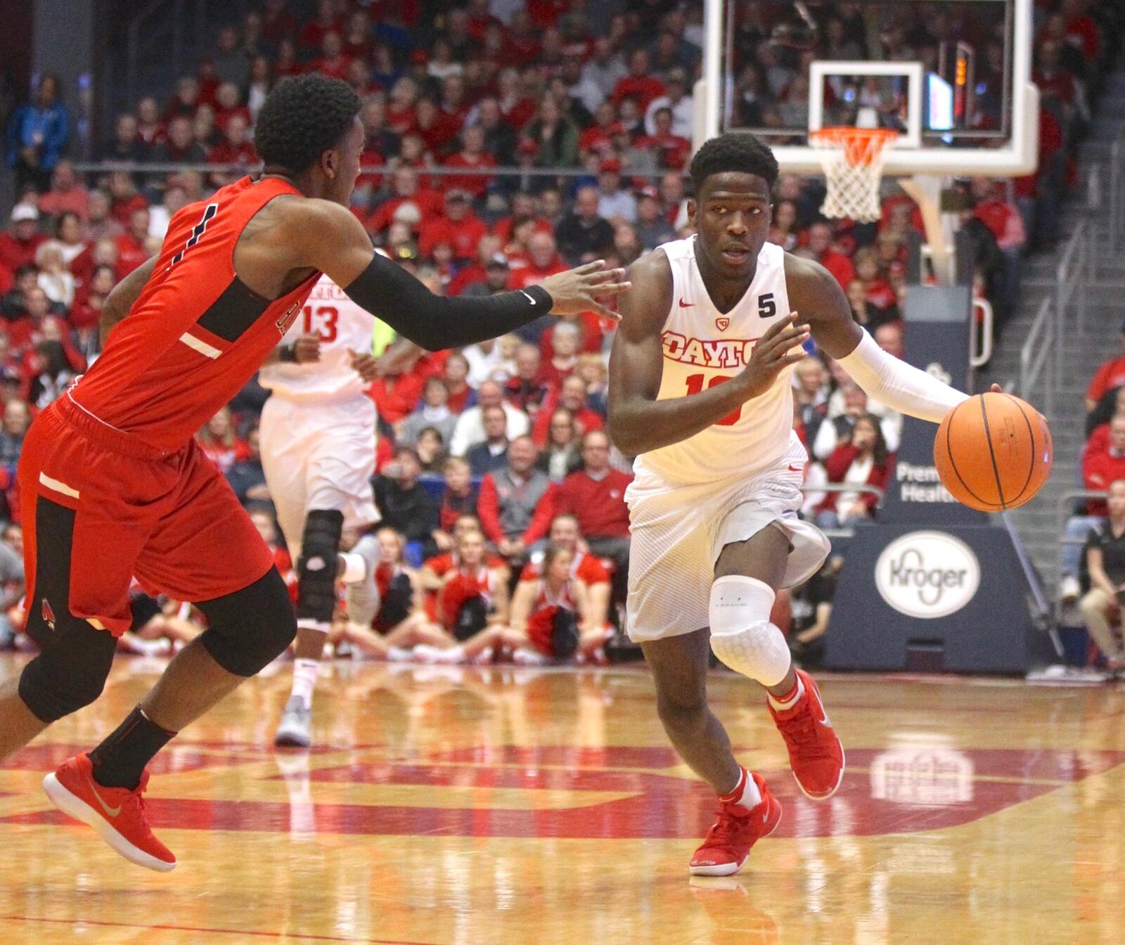 Dayton’s Jalen Crutcher brings the ball up the court against Ball State on Friday, Nov. 10, 2017, at UD Arena. David Jablonski/Staff