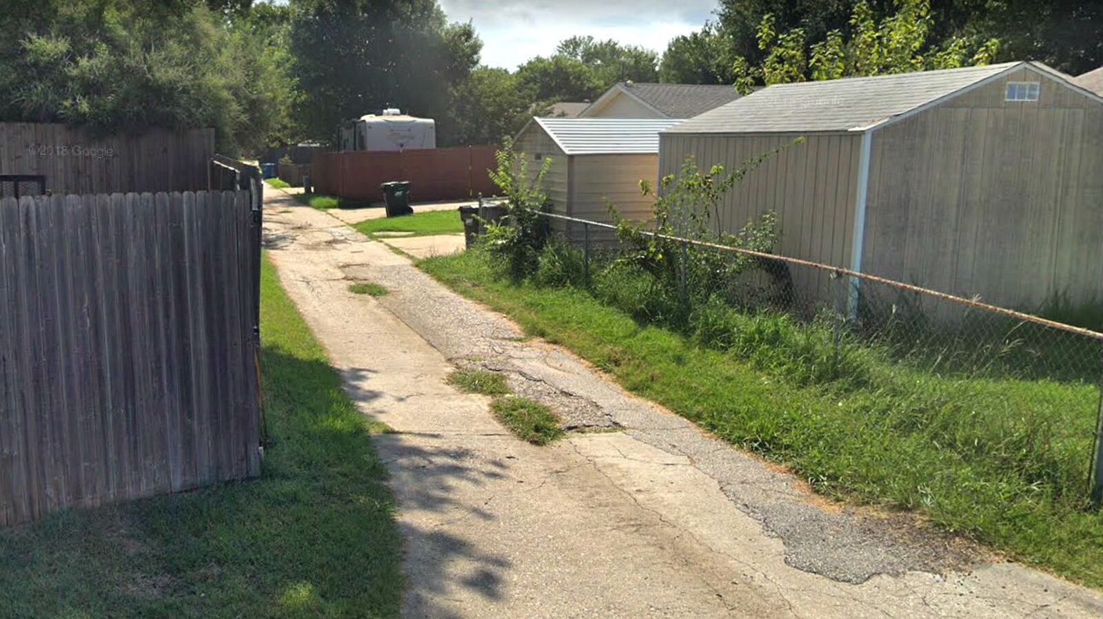 Pictured in a July 2018 Street View image is the entrance to an alley in the Colony, Texas, in which the body of Viridiana Arevalo, 23, was found Dec. 22, 2019. Her 19-year-old brother, Eduardo Arevalo, is charged with capital murder in the pregnant woman’s death.