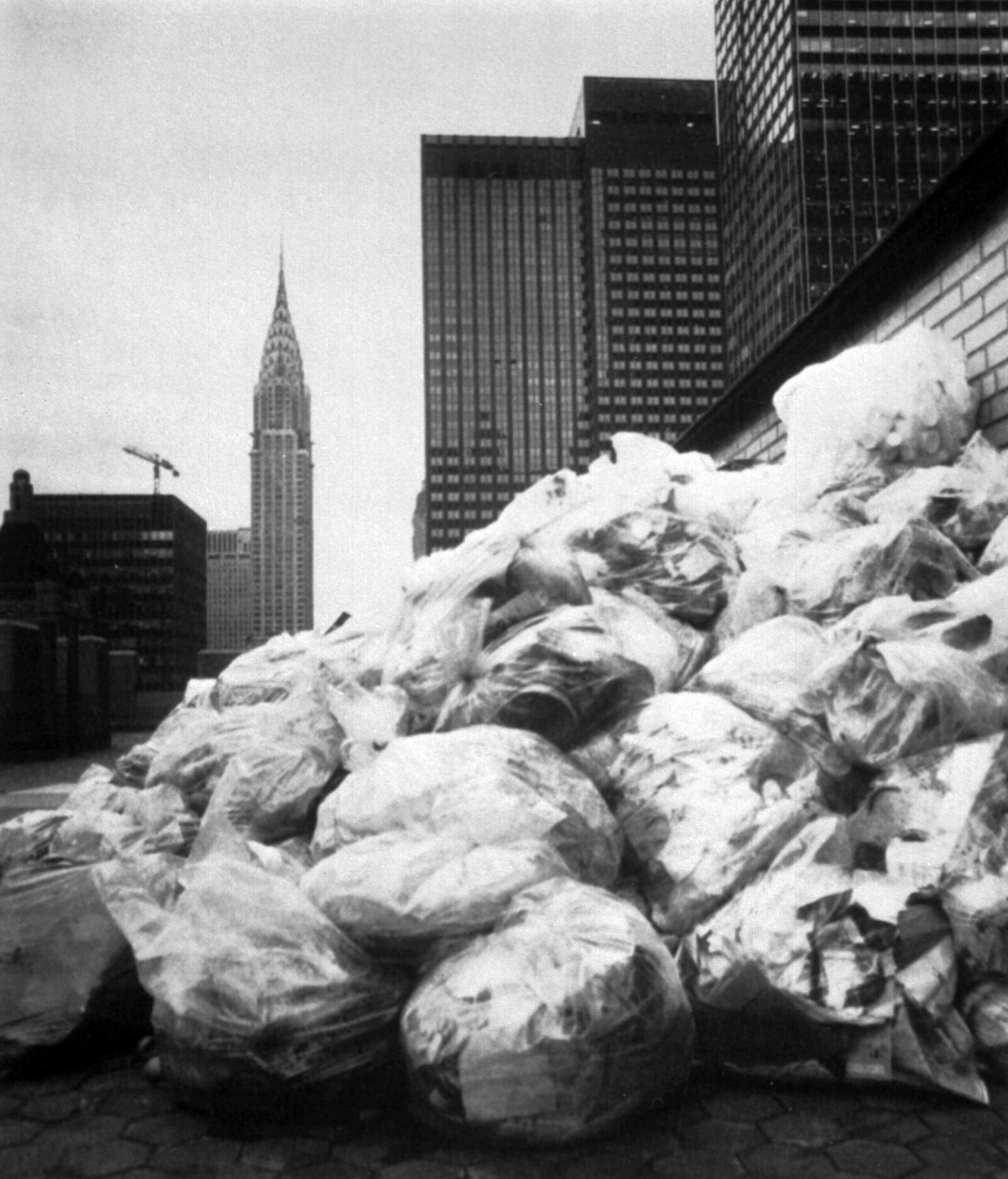 FILE - Garbage piles up on the roof of New York's Waldorf Astoria hotel during a strike by private garbage collectors, Dec. 4, 1981. (AP Photo/David Bookstaver, File)