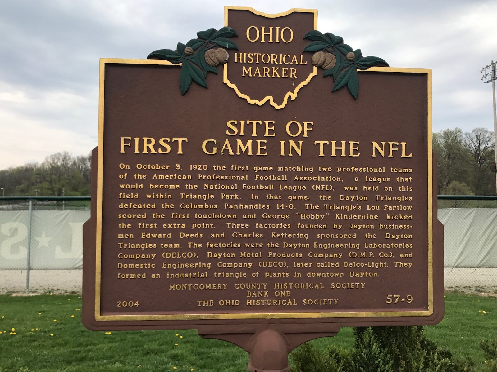 The Ohio Historical Marker designating the site of the first ever NFL game played October 3, 1920 at Triangle Park between the Dayton Triangles and Columbus Pan Handles. The factual information on the sign and the funding of it was done by Steve Presar, the local Dayton Triangles historian. As the NFL celebrates its 100th season this year, it will install new turf field near the site of where the original game was played. The Bengals will hold a preseason practice. Before that, the city of Dayton will host a gala gathering at Triangle Park on April 27 — the final day of the NFL draft and Dayton mayor Nan Whaley will announce from there one of the team s final picks in the seventh and final round. Also that day the city will break ground at Triangle for constriction of the new Revolution 360 turf field. Tom Archdeacon/STAFF