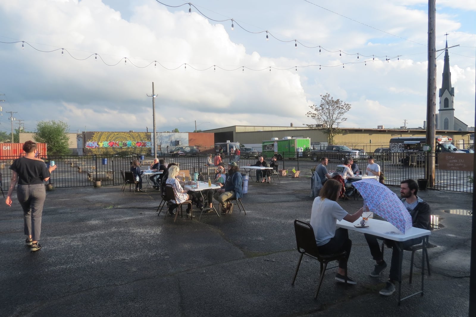 Social distancing rules and new safety measures were implemented when Yellow Cab Tavern hosted its first outdoor Food Truck Hub of the season on Friday, May 15. CONTRIBUTED