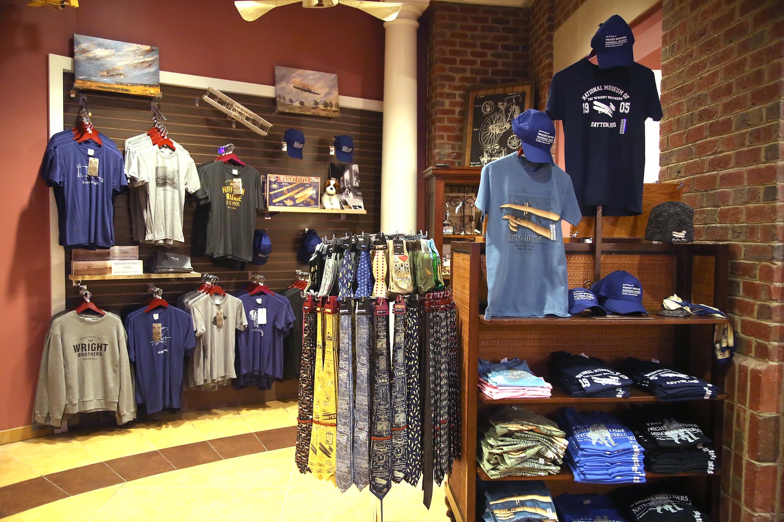 The Carillon Historical Park museum store specializes in all things Dayton including a large display of apparel.   LISA POWELL / STAFF