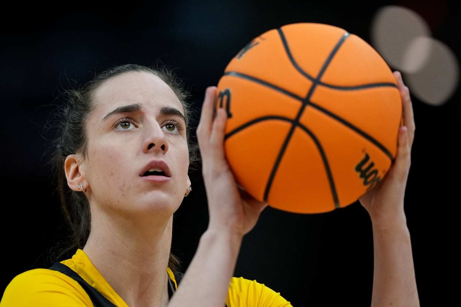 FILE - Iowa's Caitlin Clark shoots during a practice for an NCAA Women's Final Four semifinals basketball game Thursday, April 4, 2024, in Cleveland. (AP Photo/Carolyn Kaster, File)