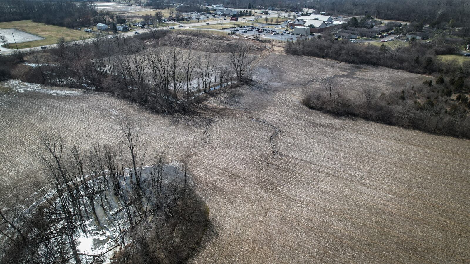 A proposed housing project is expected to bring 251 new homes to vacant land northeast of Old Troy Pike and Needmore Road -- 167 of the homes in Dayton and 84 just across the line in Riverside. The project is separate from the 256-home Willow Hills development just south of Needmore, in the same area. JIM NOELKER/STAFF