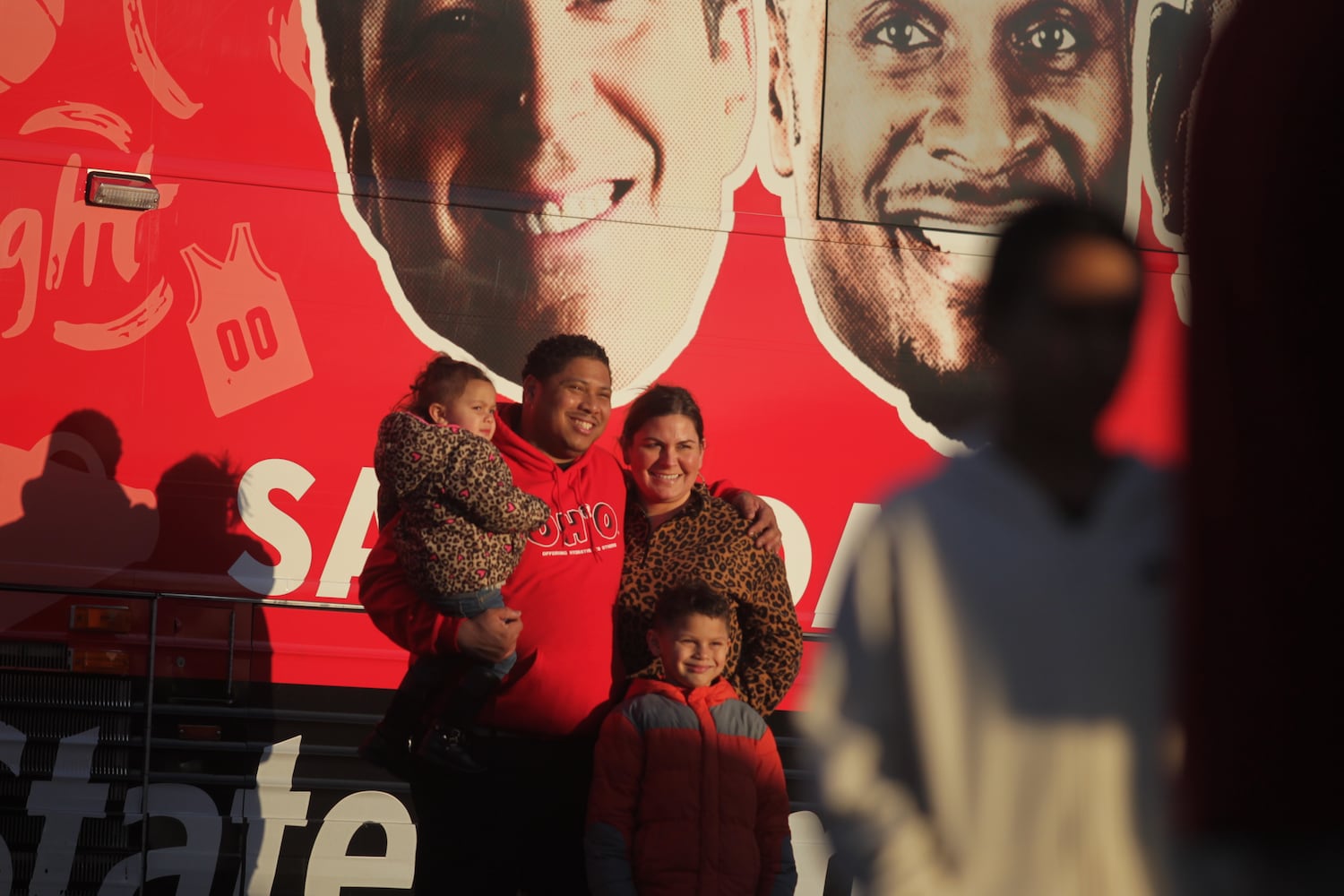 College basketball fans get an early view  of the ESPN College GameDay bus in Huber Heights at the Krogers on Old Troy Pike Thursday.