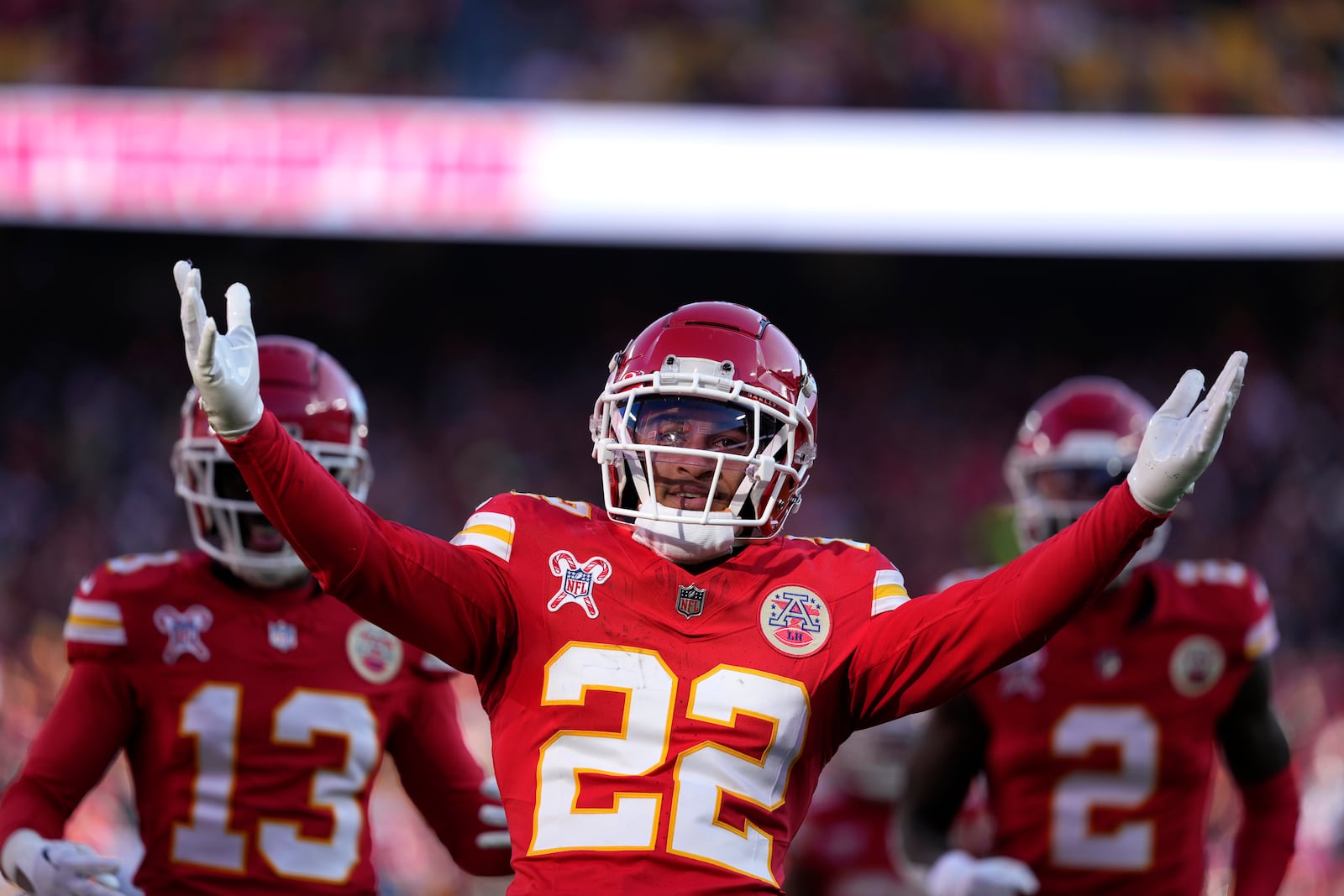 Kansas City Chiefs cornerback Trent McDuffie (22) celebrates after intercepting a pass during the first half of an NFL football game against the Houston Texans Saturday, Dec. 21, 2024, in Kansas City, Mo. (AP Photo/Ed Zurga)