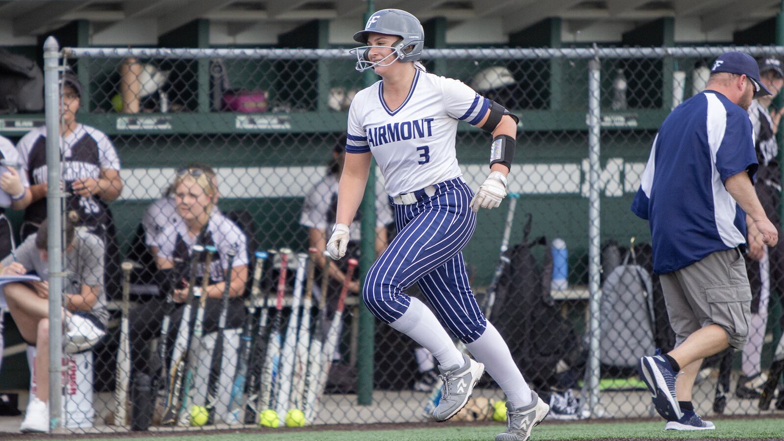 Fairmont's Madison Franz approaches home plate after hitting a home run to lead off the fourth inning against Mason during Thursday's Division I district final at Mason High School. Jeff Gilbert/CONTRIBUTED