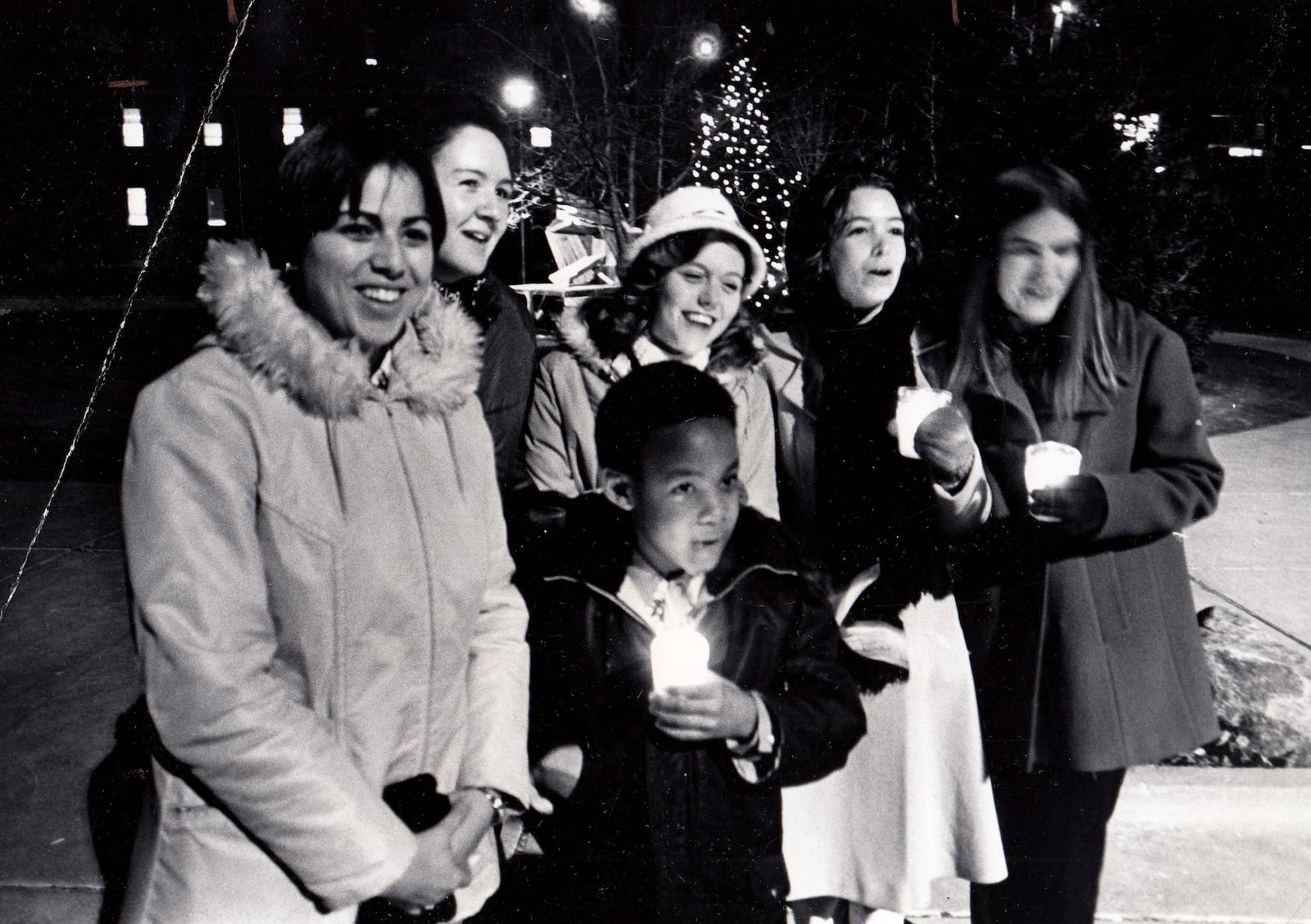 University of Dayton students sing carols with school children during UD's Christmas on Campus in 1976. DAYTON DAILY NEWS ARCHIVE