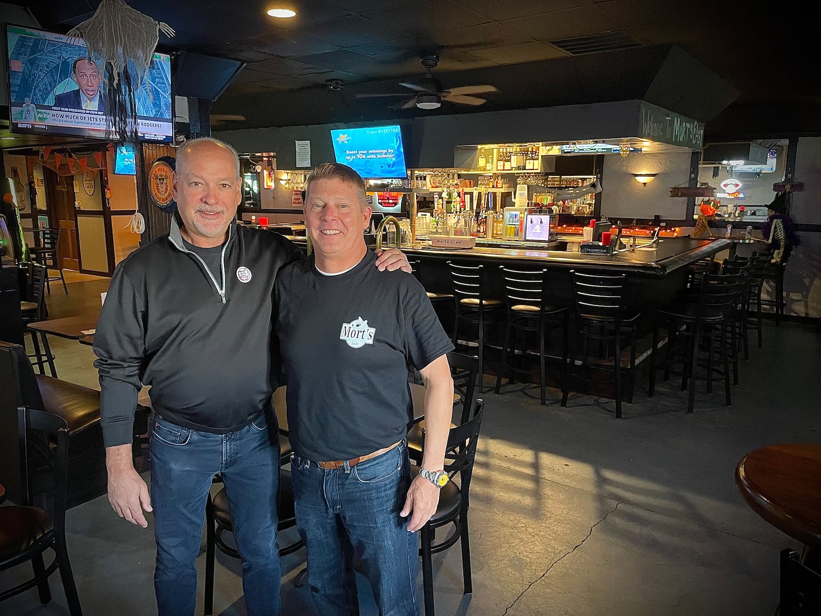 Mort’s East, a new neighborhood tavern, is open at 2866 S. Dixie Drive in Kettering. Pictured (left to right) are owners Aaron Delidow and Bob Hochwalt. NATALIE JONES/STAFF