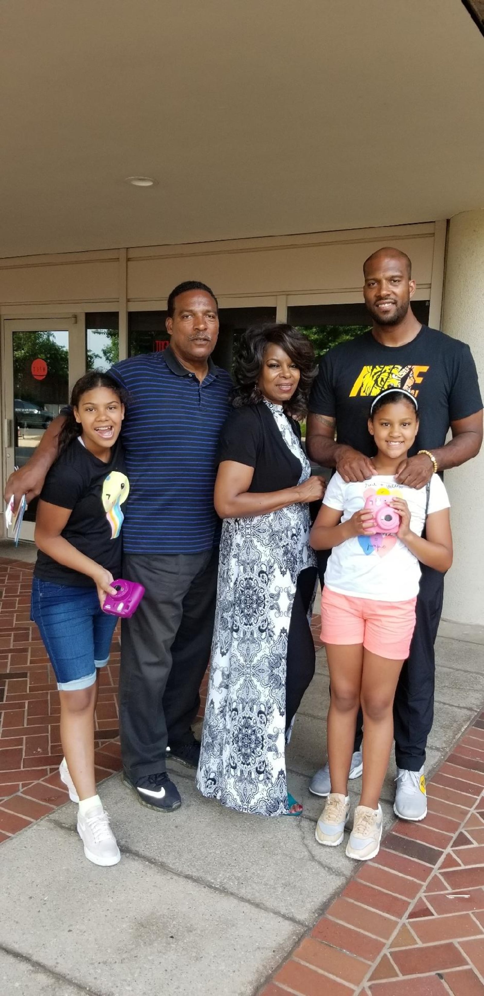 Coby Turner, right, with daughters Corina, far left, and Giana and parents Linda Grimes and Carl Turner