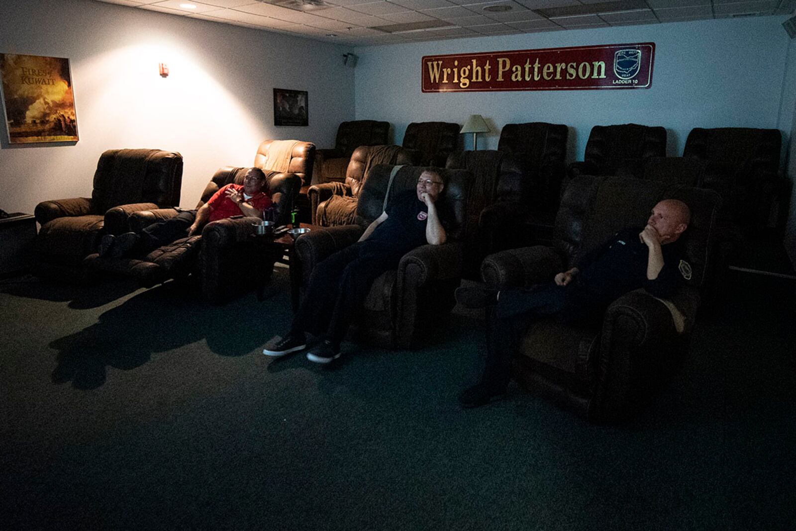 Firefighters take in a movie June 23 during their evening downtime inside Station 1 at Wright-Patterson Air Force Base. U.S. AIR FORCE PHOTO/WESLEY FARNSWORTH