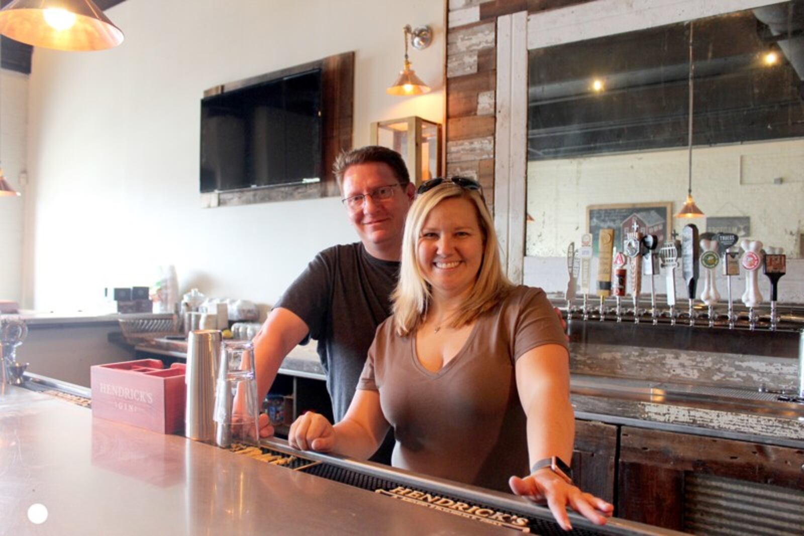 Jennifer Dean and Forrest Williams are the founders of Mudlick Tap House in downtown Dayton. AMELIA ROBINSON/STAFF