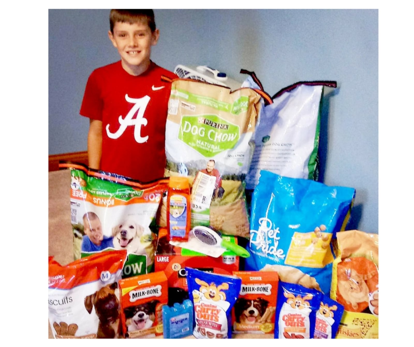 Collin Isaac collected more than 140 pounds of pet food at his birthday party in August. The items will be donated to animals impacted by Hurricane Harvey.