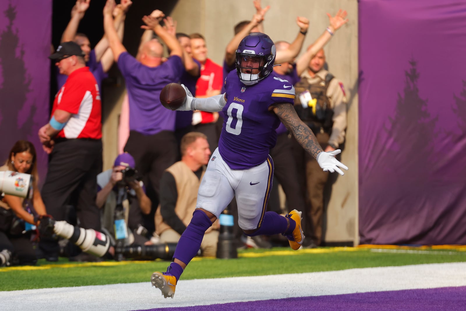 Minnesota Vikings linebacker Ivan Pace Jr. (0) scores on a 36-yard fumble recovery against the Detroit Lions during the second half of an NFL football game Sunday, Oct. 20, 2024, in Minneapolis. (AP Photo/Bruce Kluckhohn)