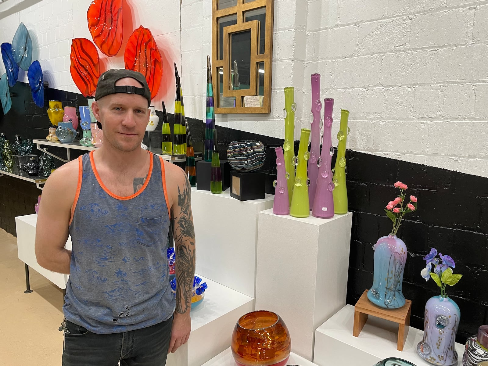 Nyminal Glass, a new glass blowing studio and gallery, is open at 1900 E. Second St. in Dayton. Pictured is Owner Dustin Wagner. NATALIE JONES/STAFF