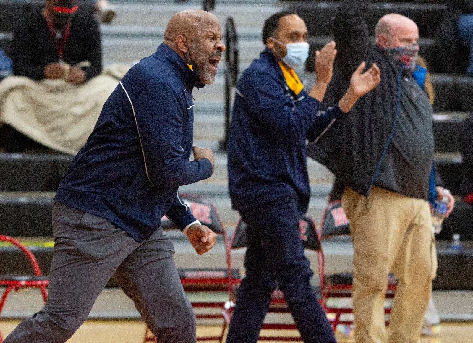 Springfield coach Shawn McCullough reacts to his team's 59-57 victory at ninth-ranked Wayne Friday night. Jeff Gilbert/CONTRIBUTED