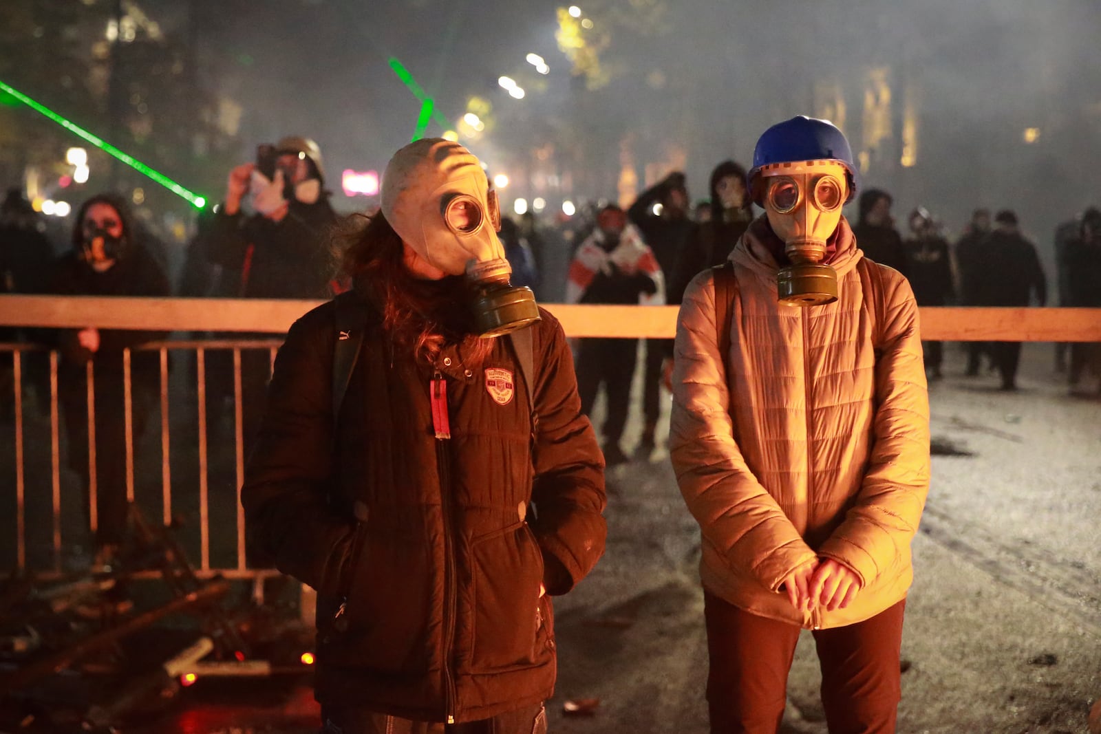 Demonstrators attend a rally to protest against the government's decision to suspend negotiations on joining the European Union in Tbilisi, Georgia, early Wednesday, Dec. 4, 2024. (AP Photo/Zurab Tsertsvadze)