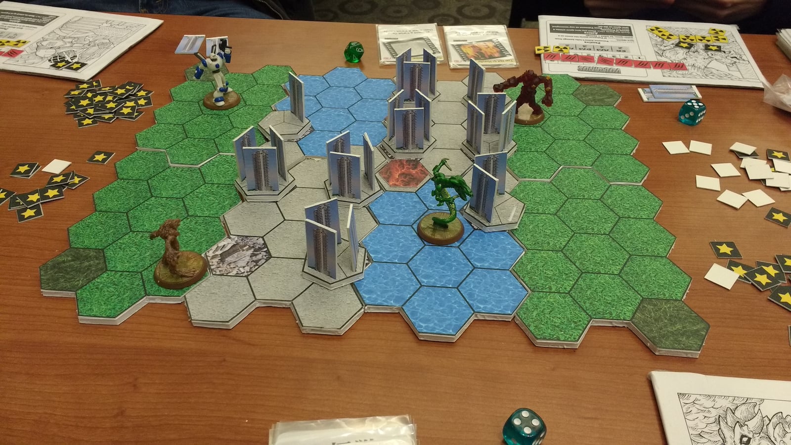 It’s an all-out war of the monsters in the smash ‘em up board game Daikaiju Director, which the designer plans to put on Kickstarter this July. Photo: Josher Lumpkin