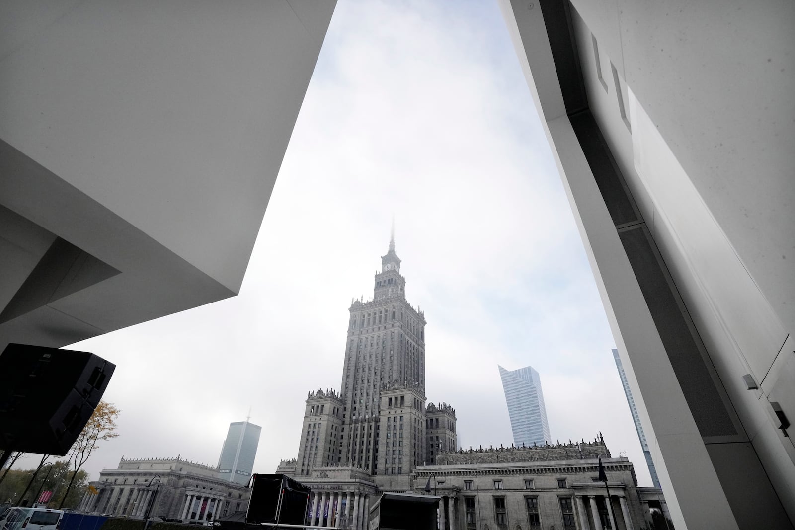 The Stalinist-era Palace of Culture and Science is seen in the background with part of the Museum of Modern Art in Warsaw, Poland, seen in the foreground on Thursday Oct. 24, 2024. (AP Photo/Czarek Sokolowski)