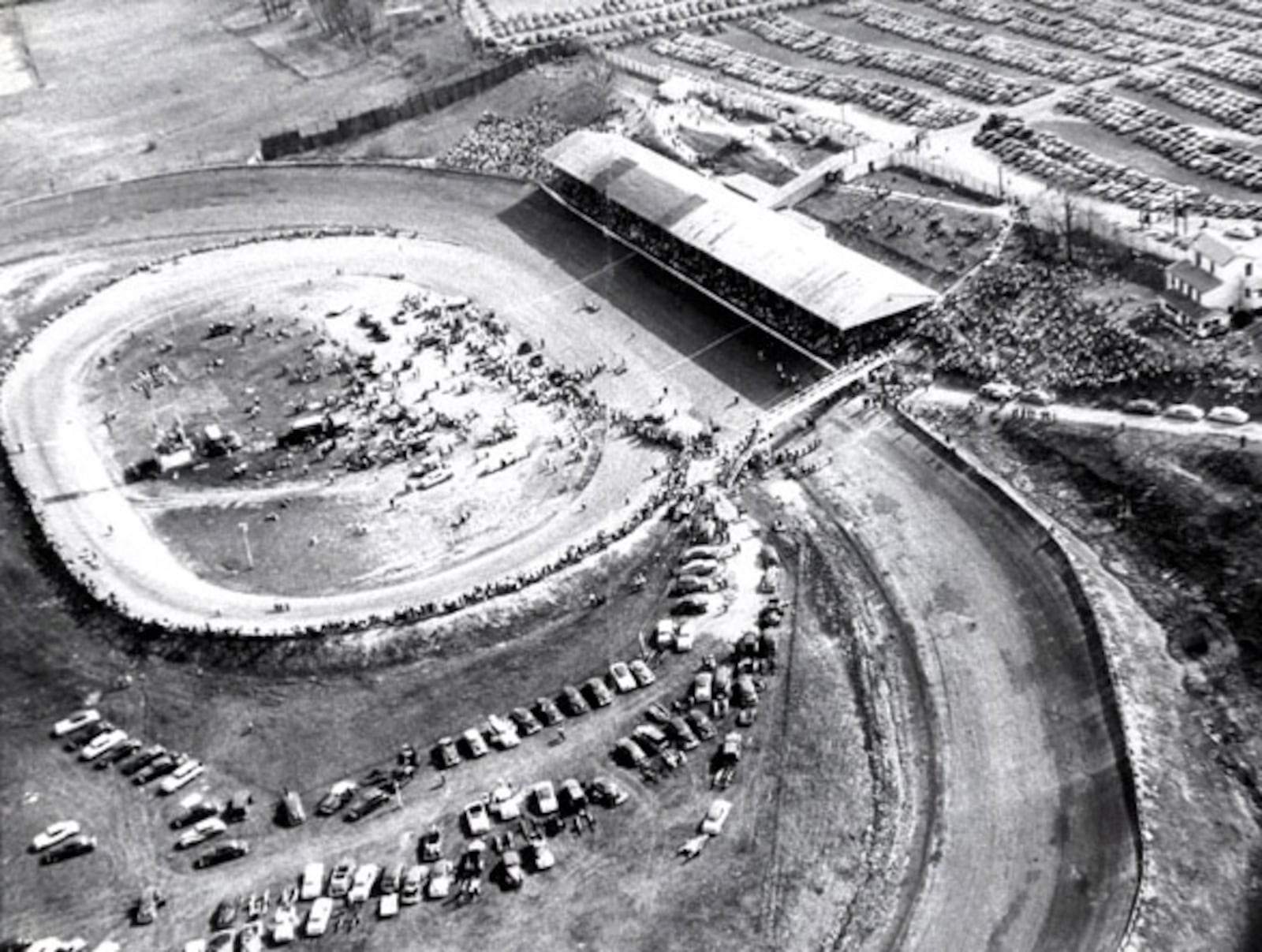 An aerial view of the aftermath of a crash that killed driver Gordon Reid in 1952 at Dayton Speedway. Reid's car hit the grandstand at the right side of the photo, killing three spectators and injuring many more. Skip Peterson Collection