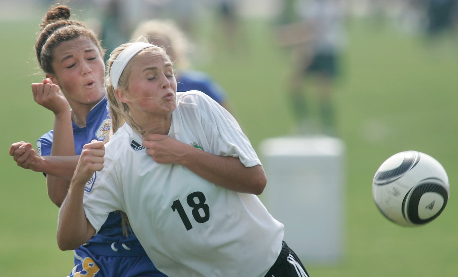 Lydia Koening, (18) from Cedarburg Wi. and 
Alexis Williams (8) from Frishers In. battle to go to the nationals at the US Youth Soccer Region 2 Championships held at Ankeney Soccer Complex in Beavercreek.
Jim Noelker/Dayton Daily News